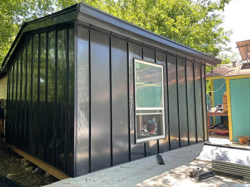 Black standing seam metal wall panels for Roof Inspection in East Fallowfield